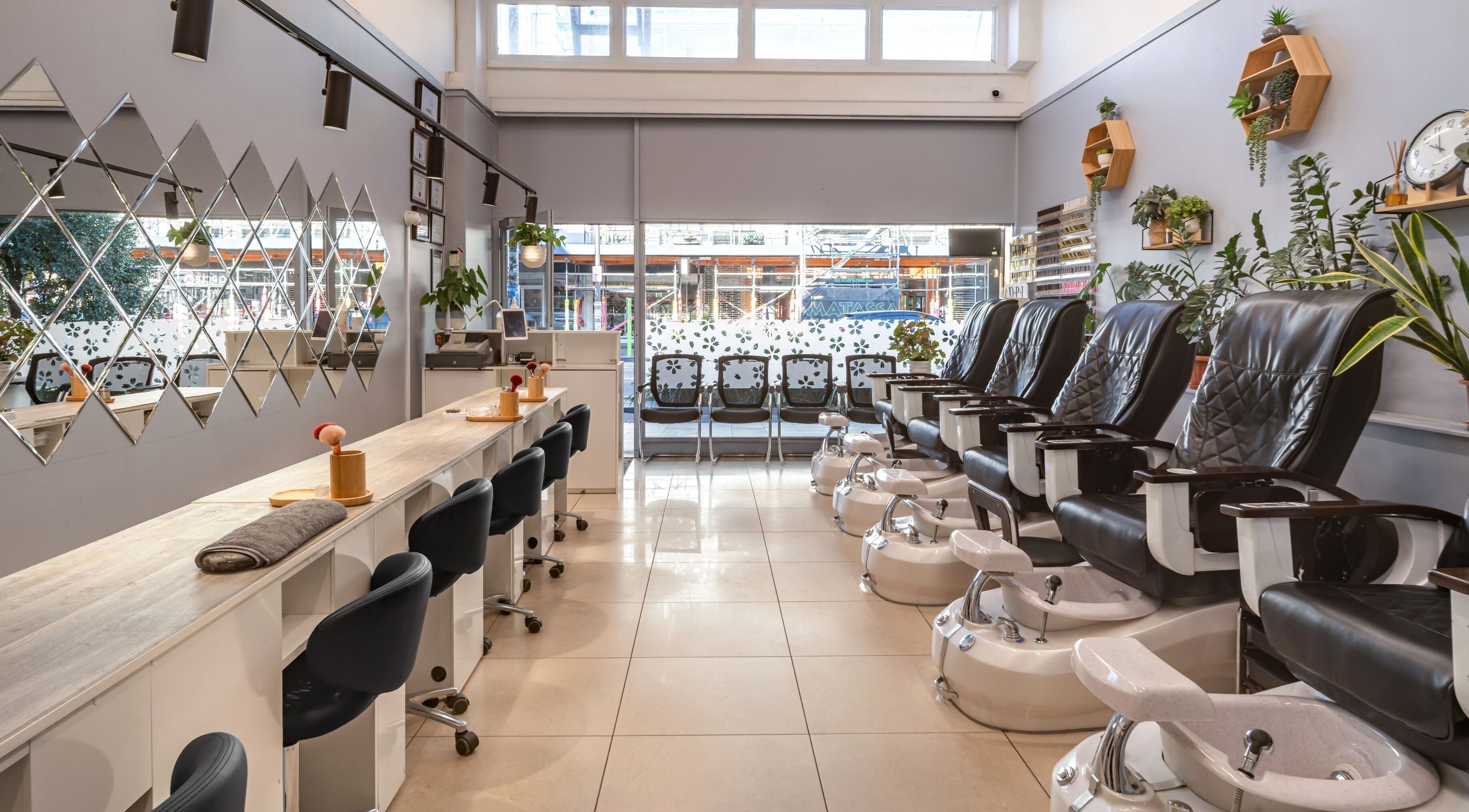 Chic nail stations and pedicure chairs at Posh Nails and Spa, Auckland, Auckland, NZ.