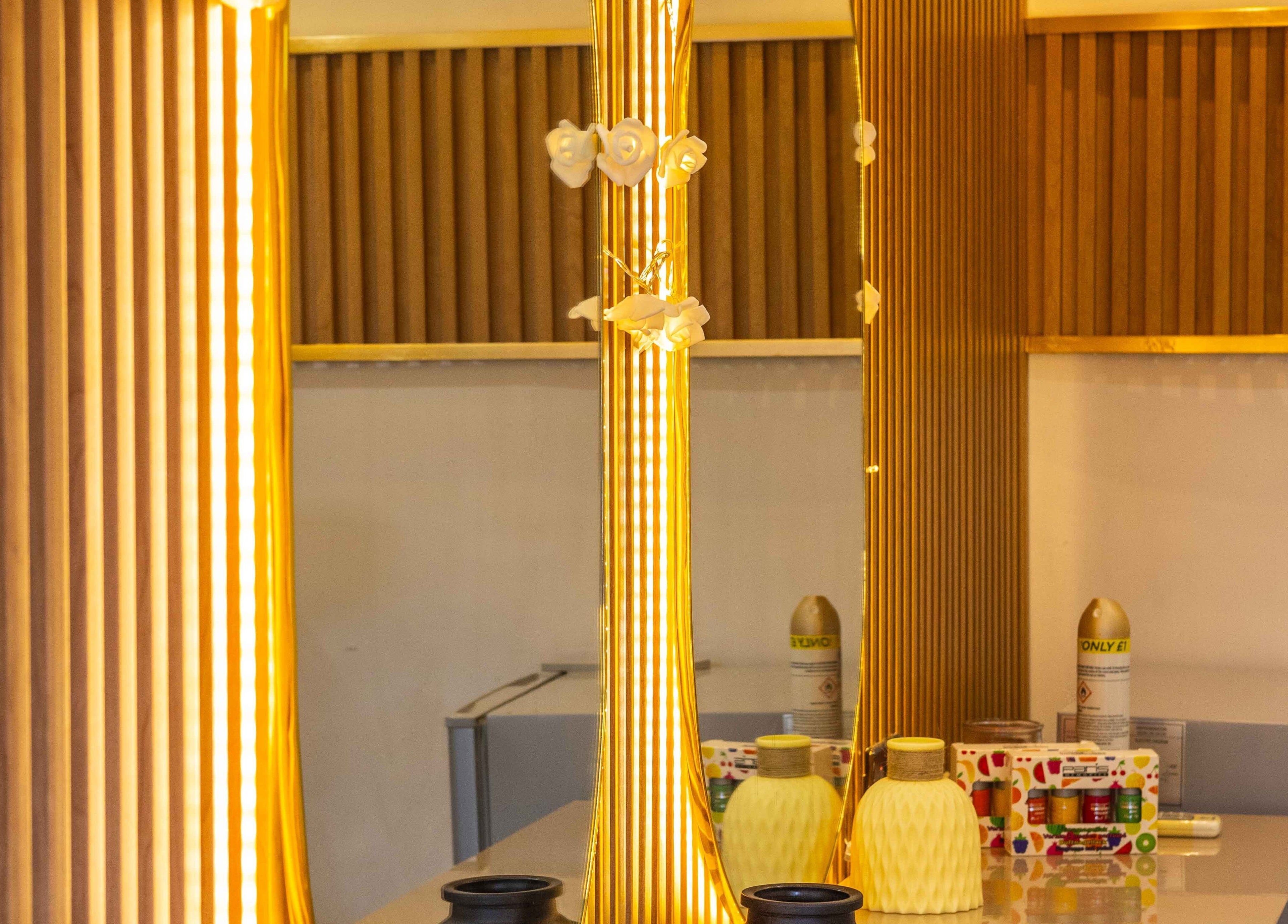 Elegant golden-lit decor at Lovevbeauty Beauty/Content Studio, Accra, Greater Accra Region, GH.