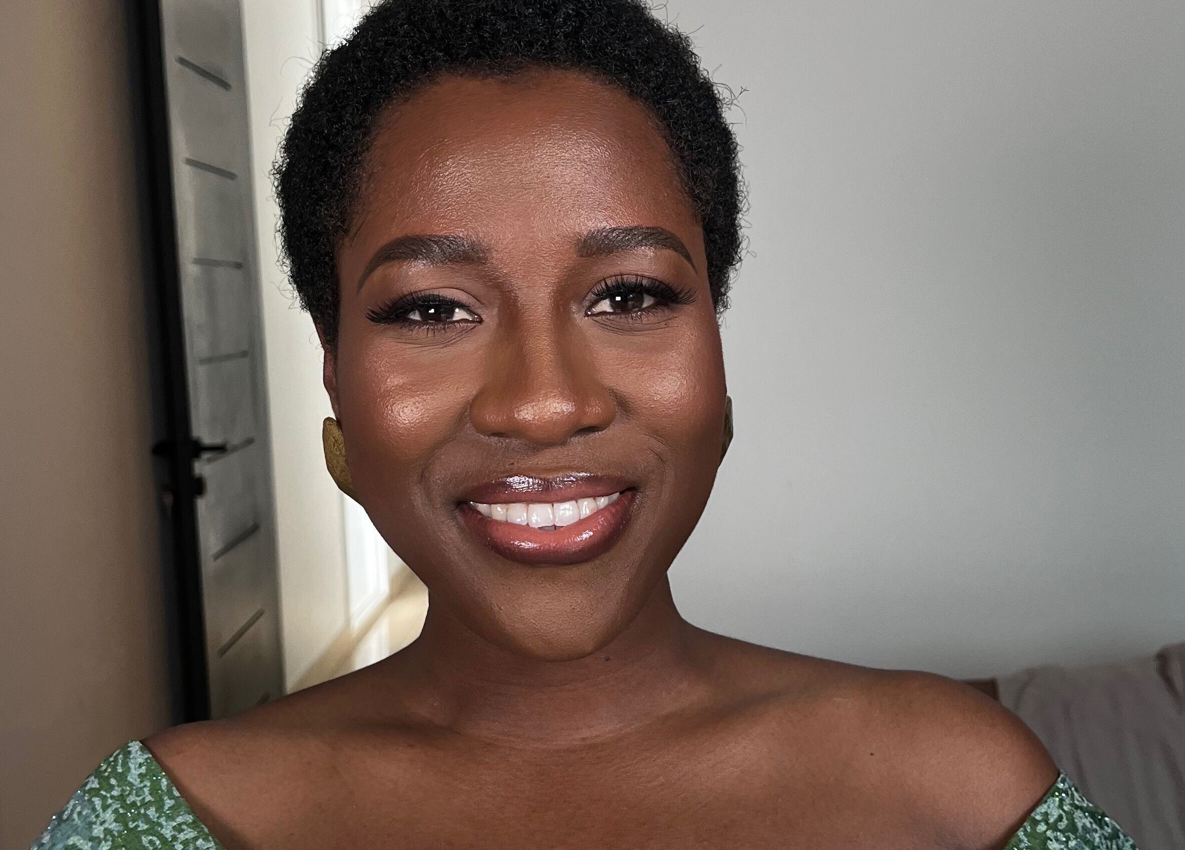 Smiling person at Lovevbeauty Beauty/Content Studio in Accra, Greater Accra Region, GH.