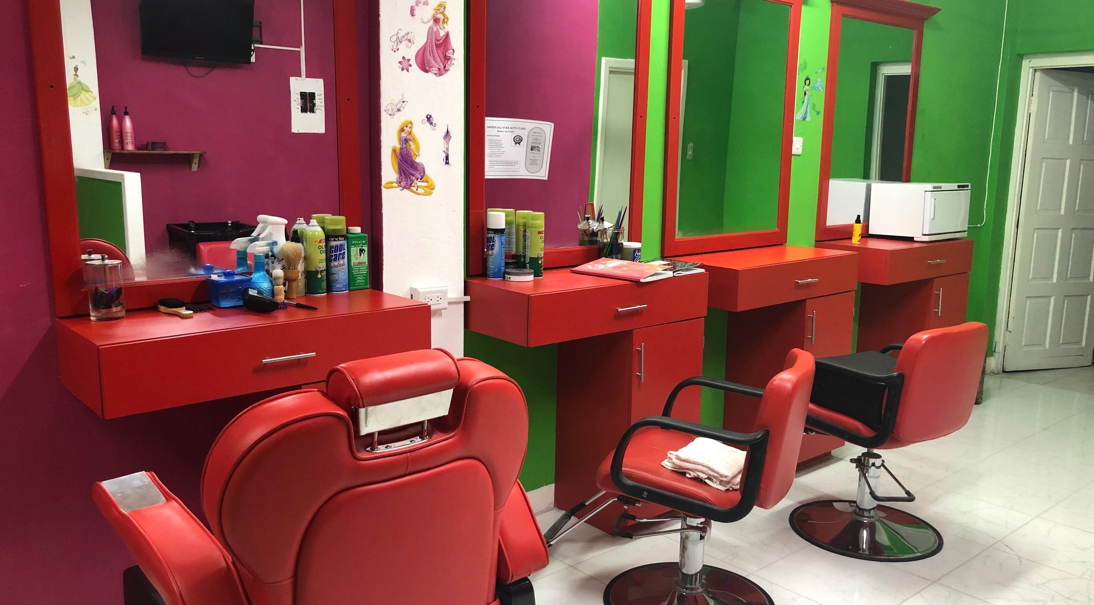Bright salon chairs at Secret Touch Hair, Nails Beauty Salon and Cosmetics, Portmore, St. Catherine Parish, JM.