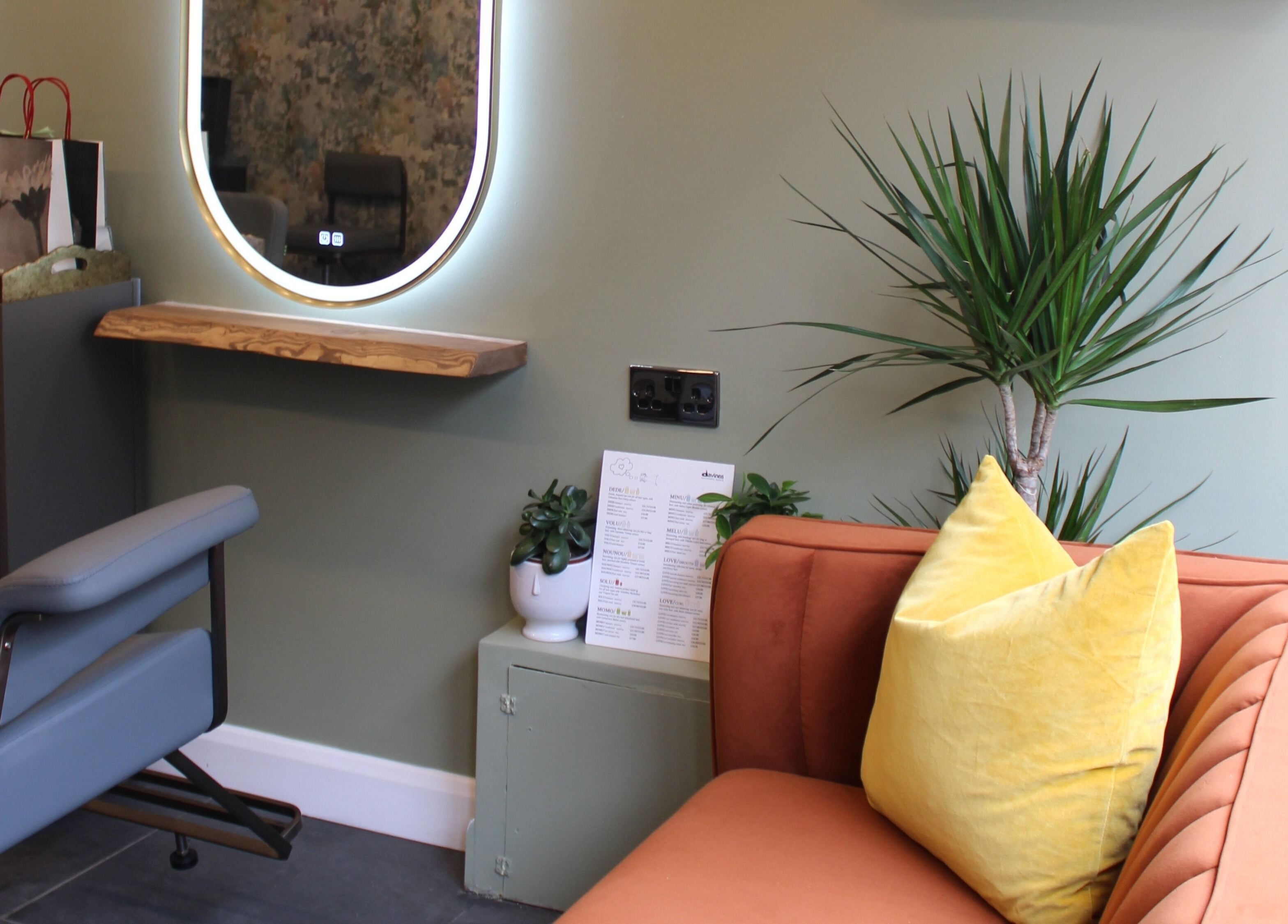 Stylish salon interior at Hair Spring Studio, London, England, GB with modern seating and elegant decor.