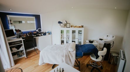 Fig Tree Cabin's tranquil treatment room, Box, England, GB offering a serene spa experience.