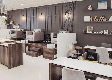 Elegant interior of Ma Cherie Nails + Beauty in Johannesburg, Gauteng, ZA, featuring cozy chairs and chic decor.