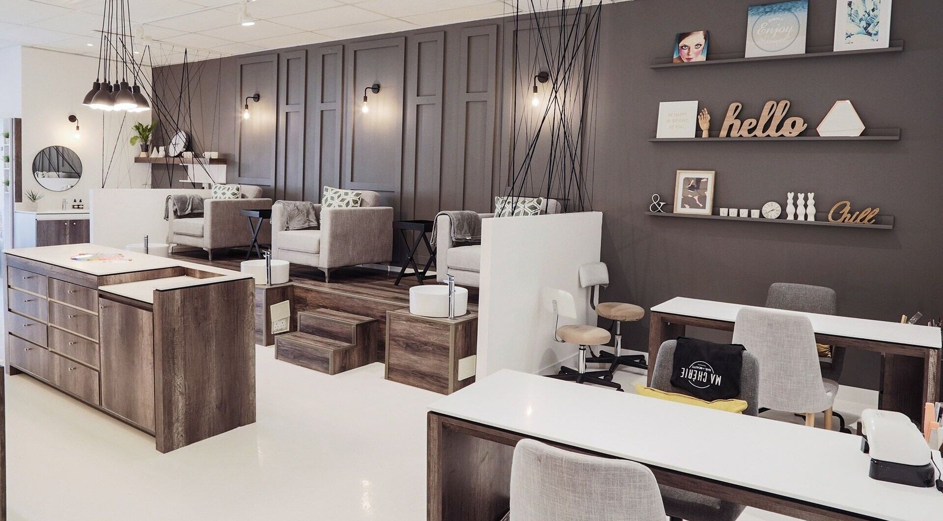Elegant interior of Ma Cherie Nails + Beauty in Johannesburg, Gauteng, ZA, featuring cozy chairs and chic decor.