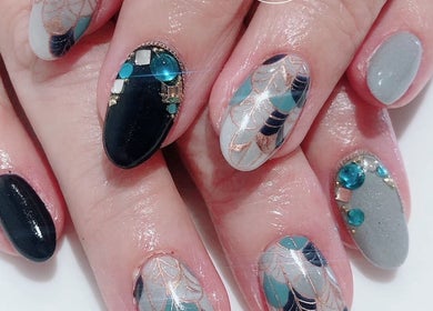 Artistic nail designs at Ma Cherie Nails + Beauty, Johannesburg, Gauteng, ZA. Stunning gem and pattern details.