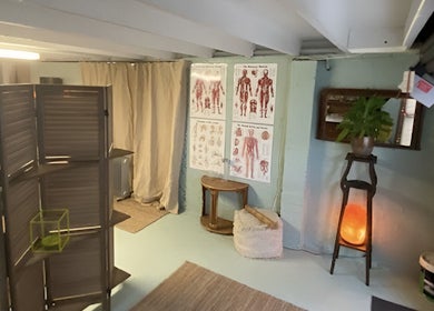 Therapy corner with anatomical charts at Natural Edge Beulah Therapy, Devonport, Tasmania, AU.
