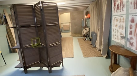 Cozy therapy room at Natural Edge Beulah Therapy, Devonport, Tasmania, AU, with relaxing decor and calming aura.