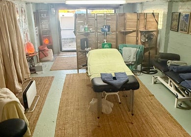Relaxing therapy room at Natural Edge Beulah Therapy, Devonport, Tasmania, AU, featuring a massage table and calming decor.