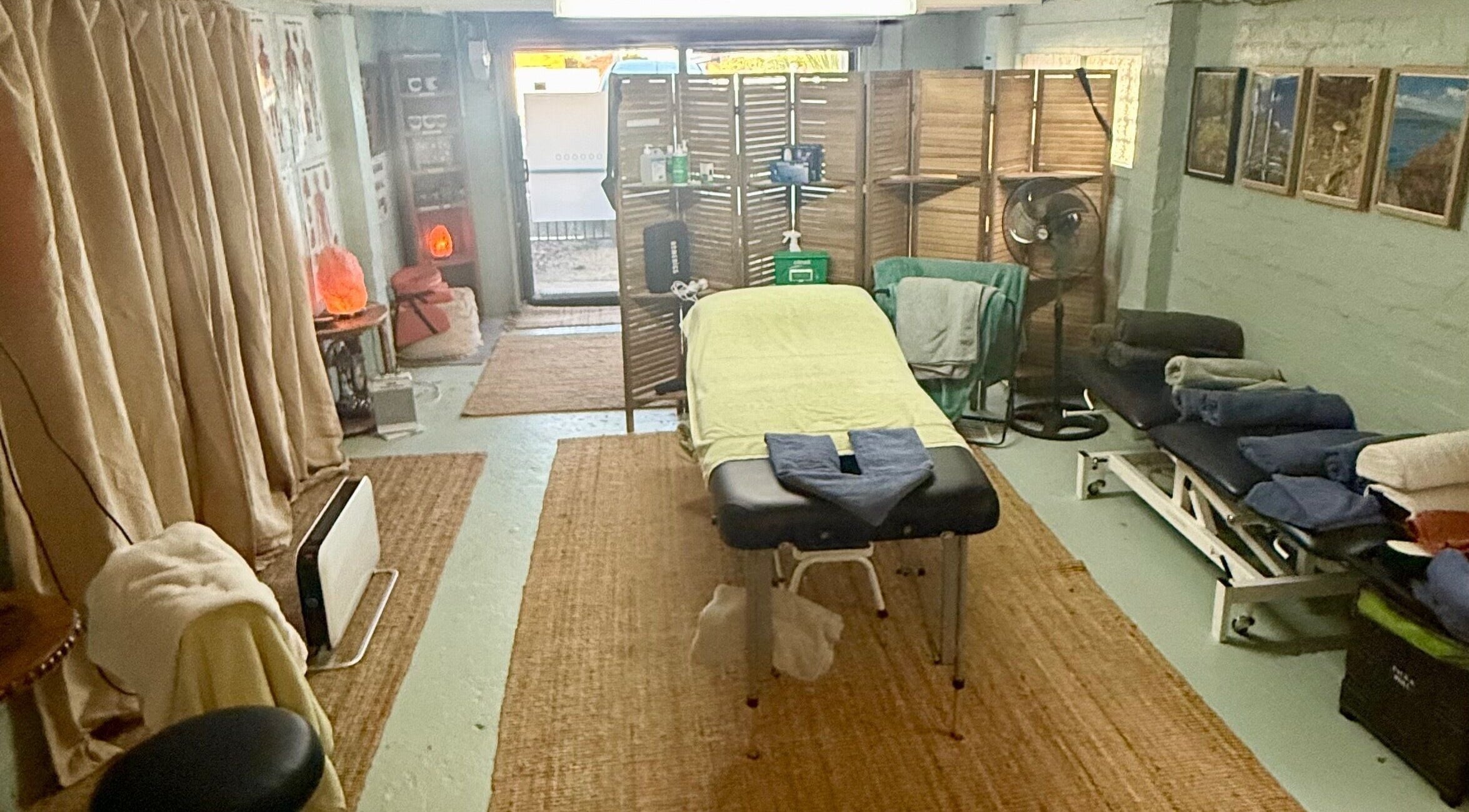 Cozy therapy room at Natural Edge Beulah Therapy, Devonport, Tasmania, AU with massage table and serene decor.