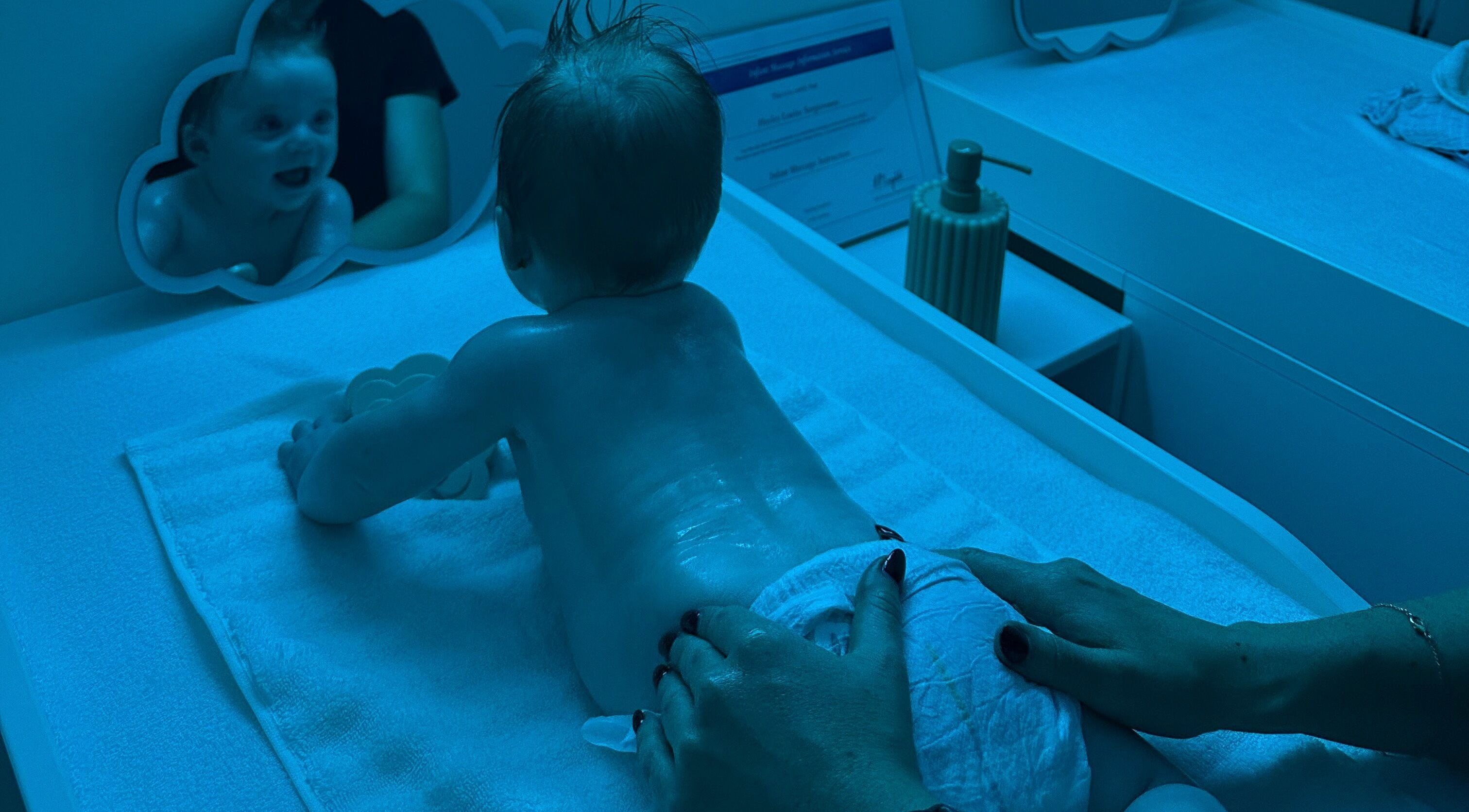 Baby enjoys a soothing massage at Daydreams Infant Massage in Dianella, Western Australia, AU.