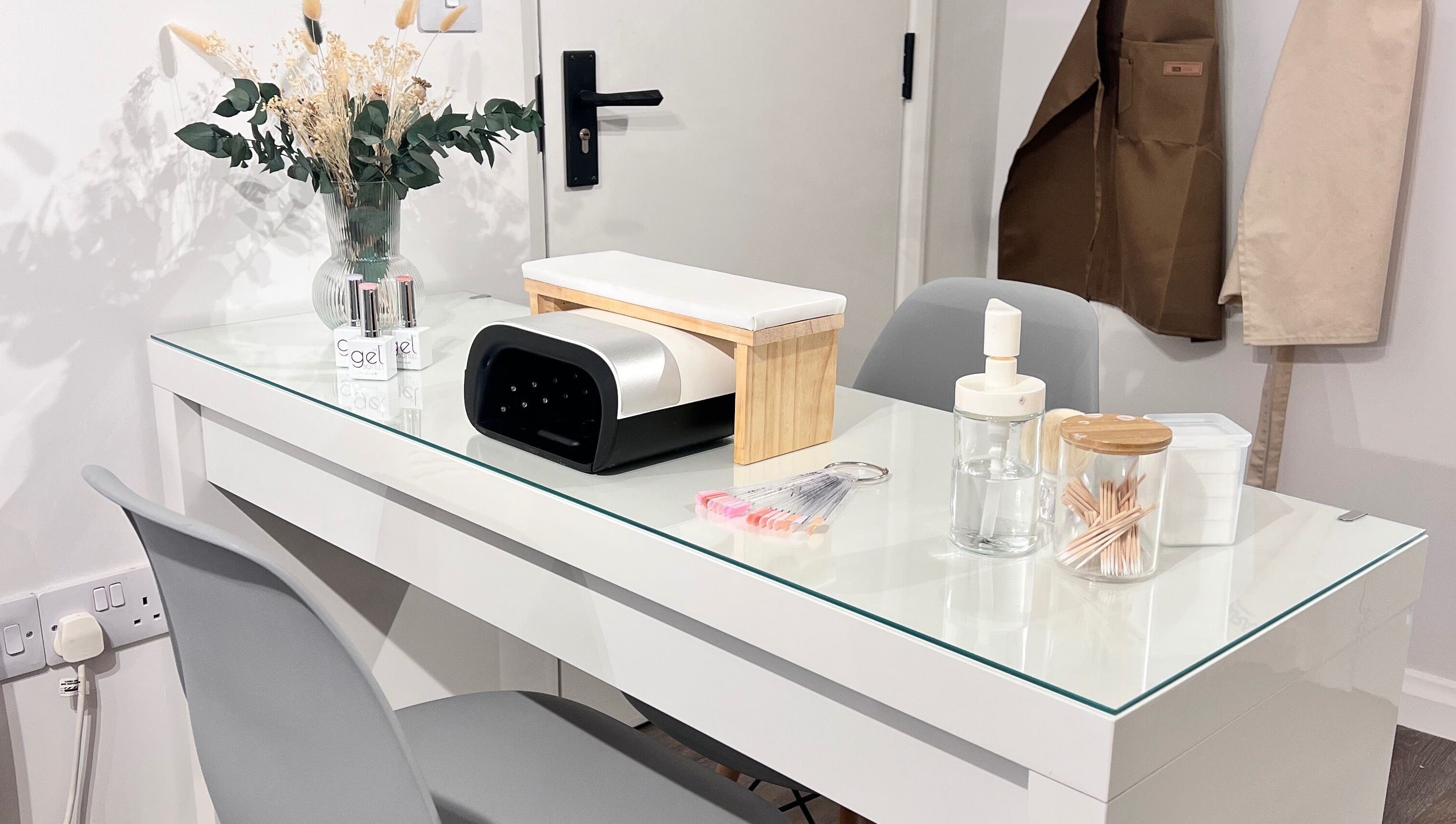 Manicure station at A Touch of Beauty by Jasmine Charlotte in Hereford, England, GB, showcasing tools and decor.