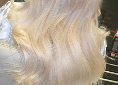 Elegant blonde waves styled at Kira Lee, Bateau Bay, New South Wales, AU salon.