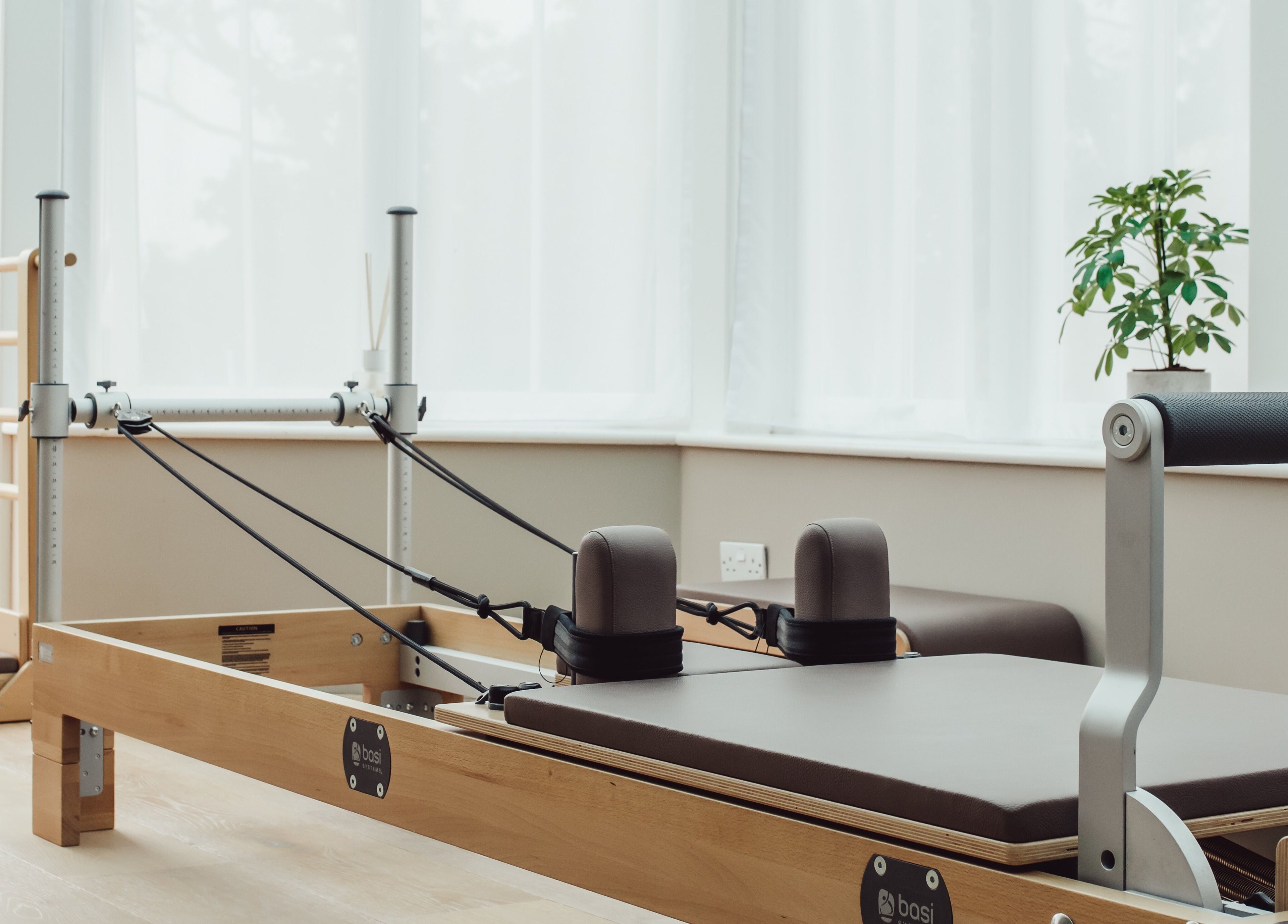 Pilates reformer in a bright studio at Reform Pilates ~ Rebecca Middleton, St. Ouen, Jersey, JE.