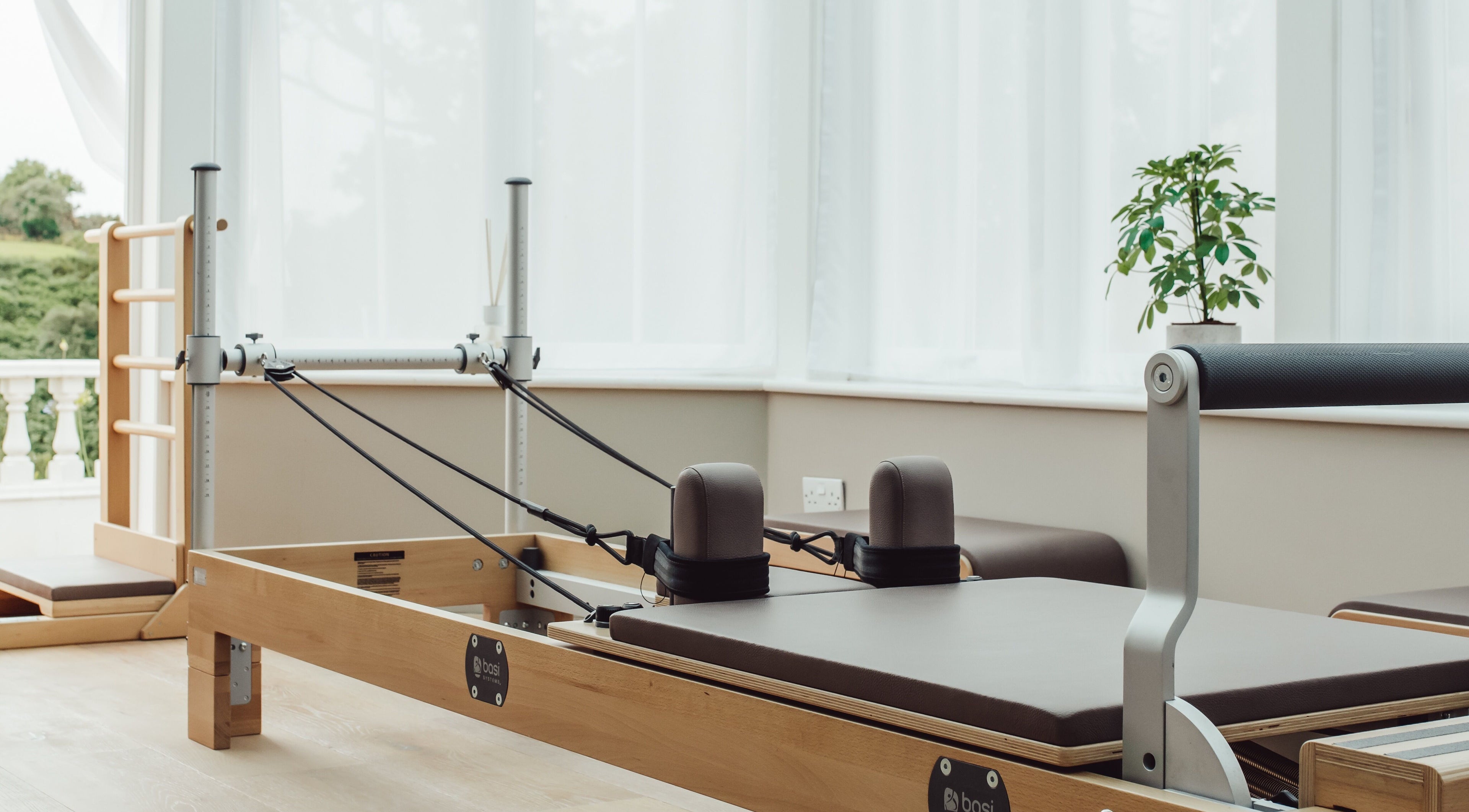 Pilates reformer in a bright studio at Reform Pilates ~ Rebecca Middleton, St. Ouen, Jersey, JE.