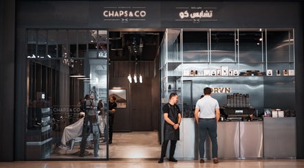 Entrance of Chaps & Co Yas Mall, a modern barbershop in Abu Dhabi, Abu Dhabi, AE with sleek interior design.