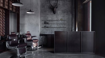 Sophisticated barber chairs inside Chaps & Co Dubai Marina, Dubai, Dubai, AE, blending modern and rustic decor.