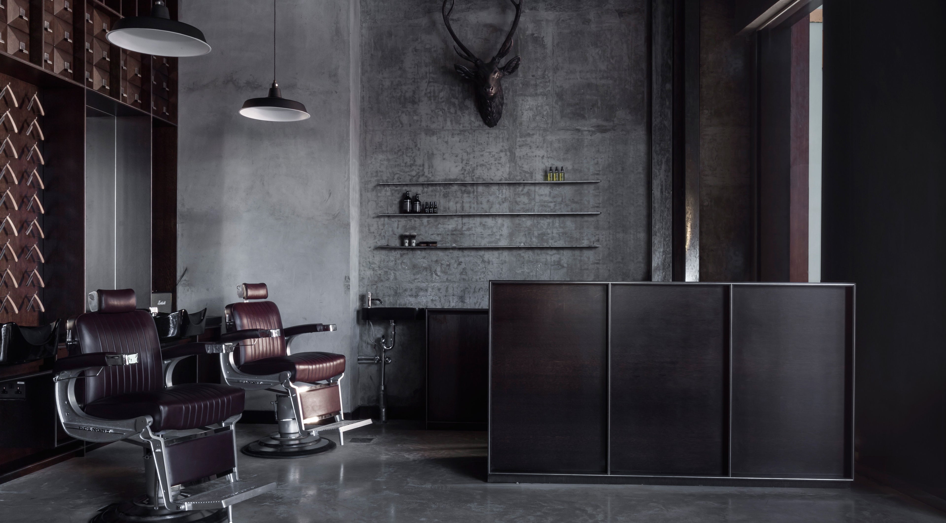 Sophisticated barber chairs inside Chaps & Co Dubai Marina, Dubai, Dubai, AE, blending modern and rustic decor.