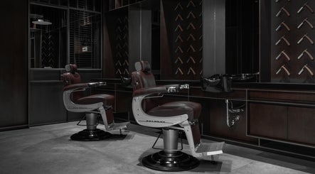Luxurious barber chairs inside Chaps & Co - Bloomingdale's, Dubai, Dubai, AE. Stylish and sophisticated interior.