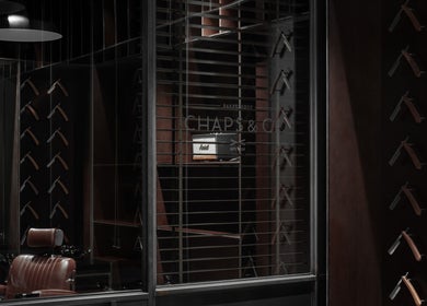 Interior of Chaps & Co - Bloomingdale's, showcasing sleek barber tools in Dubai, Dubai, AE.