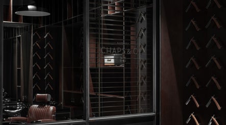 Interior of Chaps & Co - Bloomingdale's, showcasing sleek barber tools in Dubai, Dubai, AE.