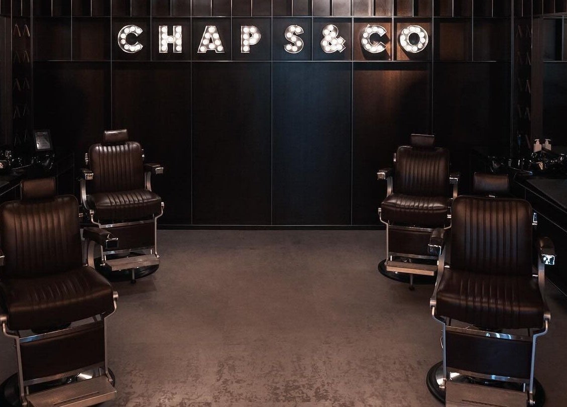 Chic barber chairs at Chaps & Co Yas Mall in Abu Dhabi, Abu Dhabi, AE, showcasing luxury grooming.