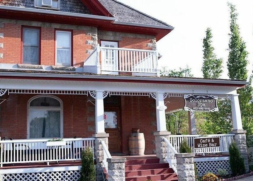 Charming exterior of Solorzano Spa Ltd in Red Deer, Alberta, CA with classic architecture and welcoming porch.