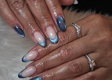 Stunning blue ombre manicure at Lash Infinity, Miller, New South Wales, AU showcasing elegance and style.