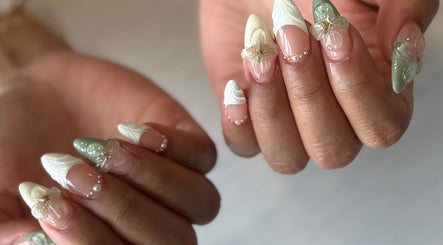 Close-up of floral nail art at Milk and Honey Nail Studio, Hamilton, Waikato Region, NZ.