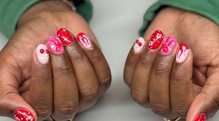 Vibrant cherry and floral nail art at Milk and Honey Nail Studio, Hamilton, Waikato Region, NZ.
