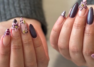 Detailed nail art at Milk and Honey Nail Studio, Hamilton, Waikato Region, NZ showcasing floral designs.
