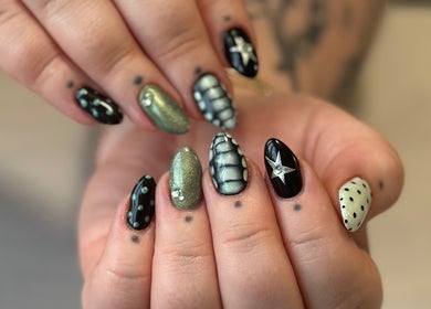 Chic star-studded nail art at Milk and Honey Nail Studio, Hamilton, Waikato Region, NZ.