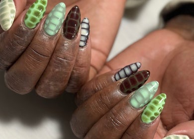 Unique nail designs at Milk and Honey Nail Studio, Hamilton, Waikato Region, NZ, showcasing trendy patterns.