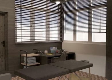 Calm therapy room at ZONE RECOVERY, London, England, GB with massage table and modern decor.