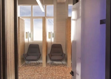 Comfortable lounge chairs at ZONE RECOVERY, London, England, GB, offering a tranquil recovery space.