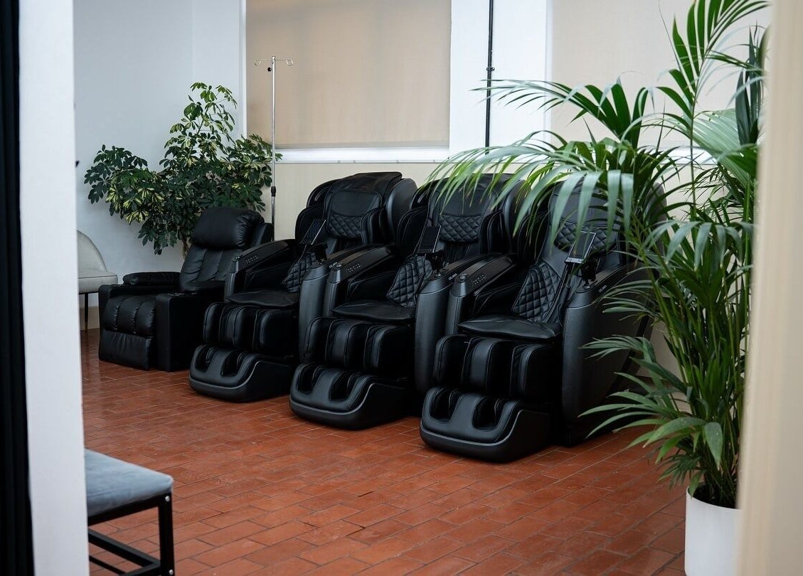 Luxurious massage chairs at ZONE RECOVERY, London, England, GB, offering ultimate relaxation.