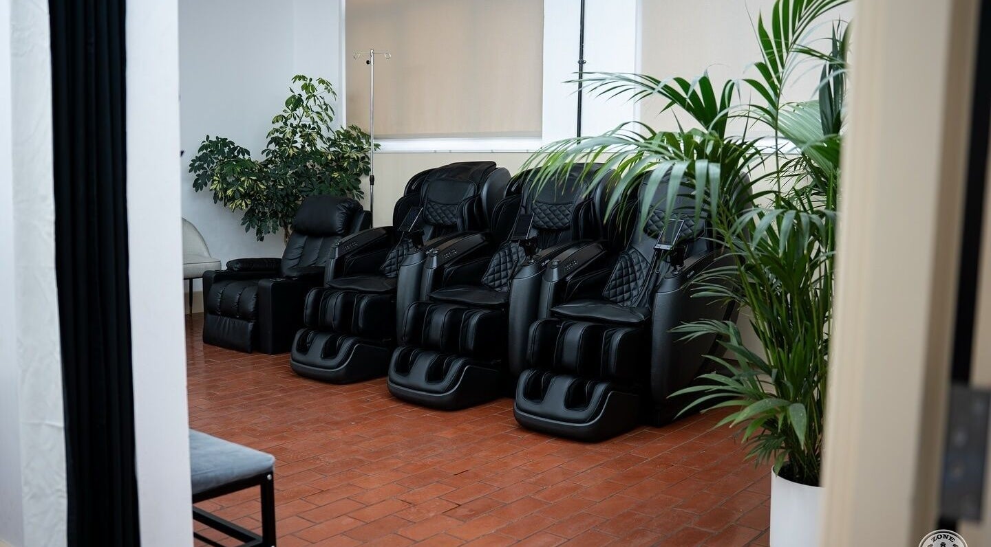 Luxurious massage chairs at ZONE RECOVERY, London, England, GB, offering ultimate relaxation.