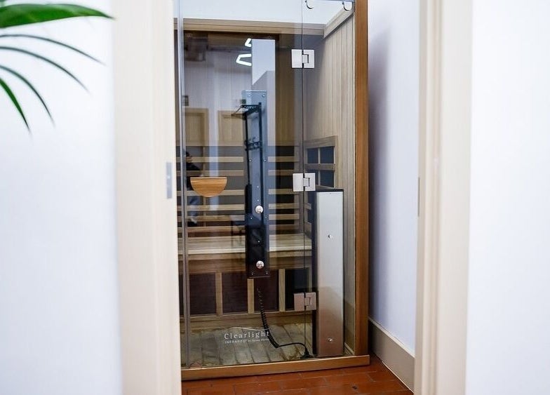 Relax in ZONE RECOVERY's modern sauna, London, England, GB. Inviting wellness space for ultimate comfort.