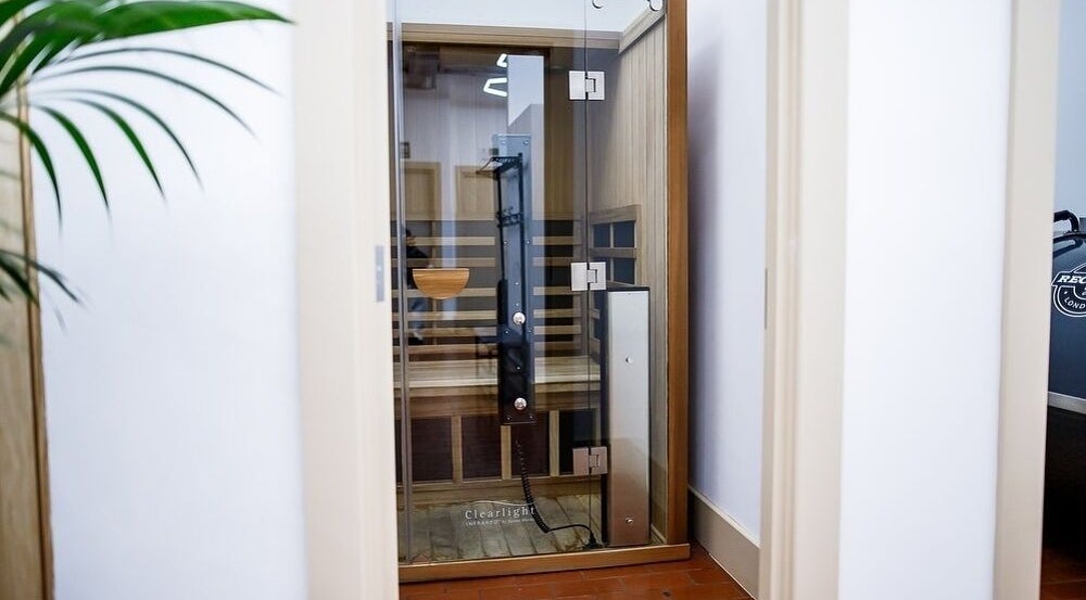 Relax in ZONE RECOVERY's modern sauna, London, England, GB. Inviting wellness space for ultimate comfort.