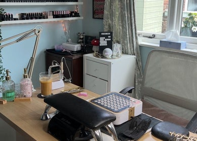 Chic nail station at Beauty By Phoebs in Reigate, England, GB, showcasing a stylish and inviting workspace.