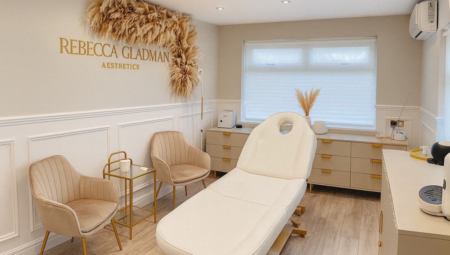 Elegant treatment room at Rebecca Gladman Aesthetics in Kings Langley, England, featuring modern decor.