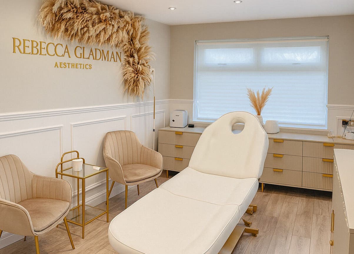 Elegant treatment room at Rebecca Gladman Aesthetics in Kings Langley, England, featuring modern decor.