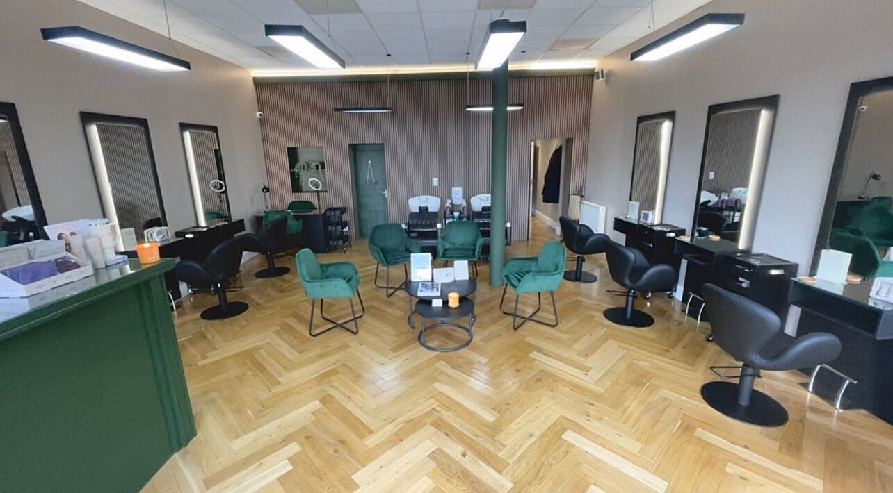 Modern interior of Hair Lounge by Abbie, Edinburgh, Scotland, GB, featuring stylish seating and salon stations.