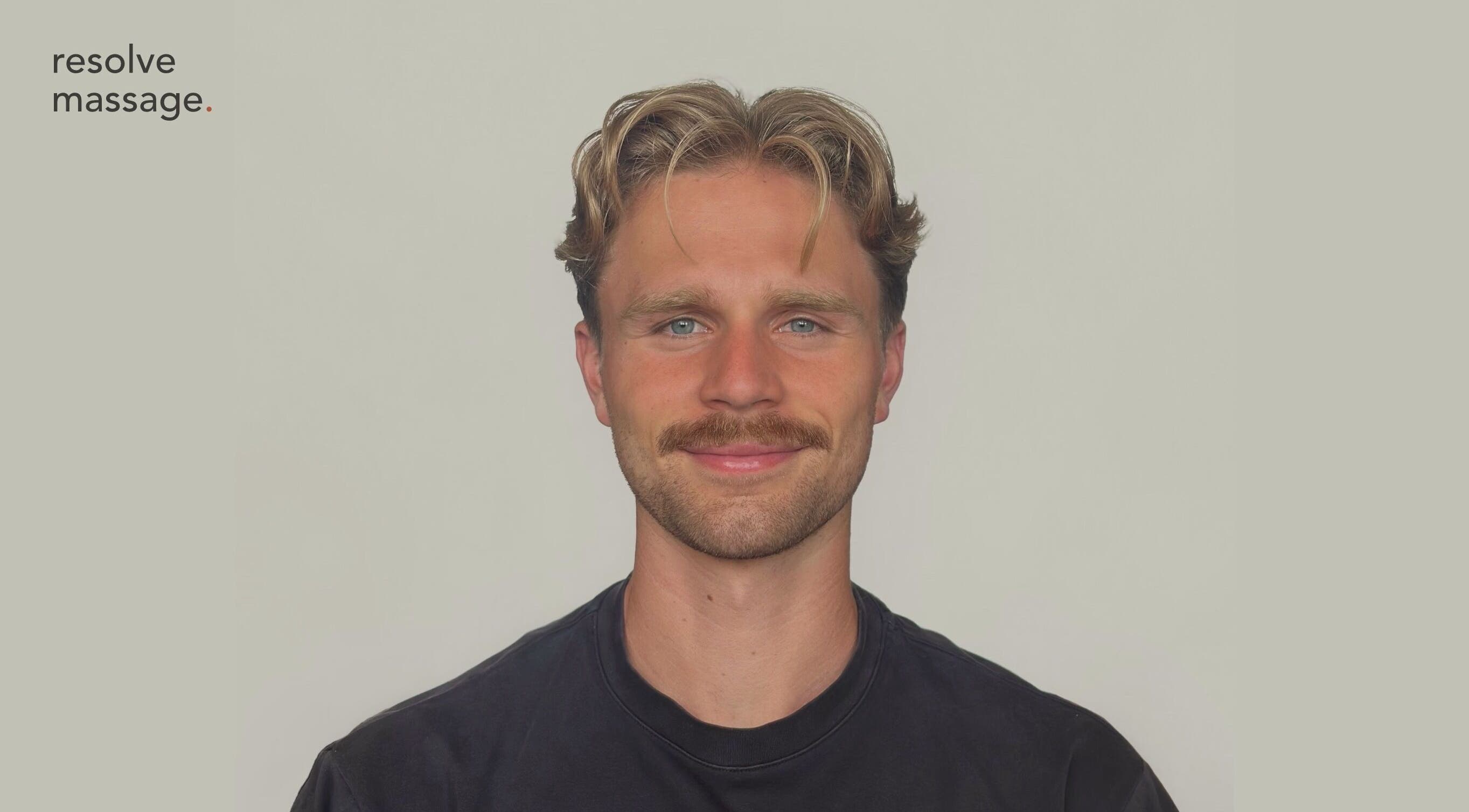 Smiling person at Resolve Massage, Bournemouth, England, GB.