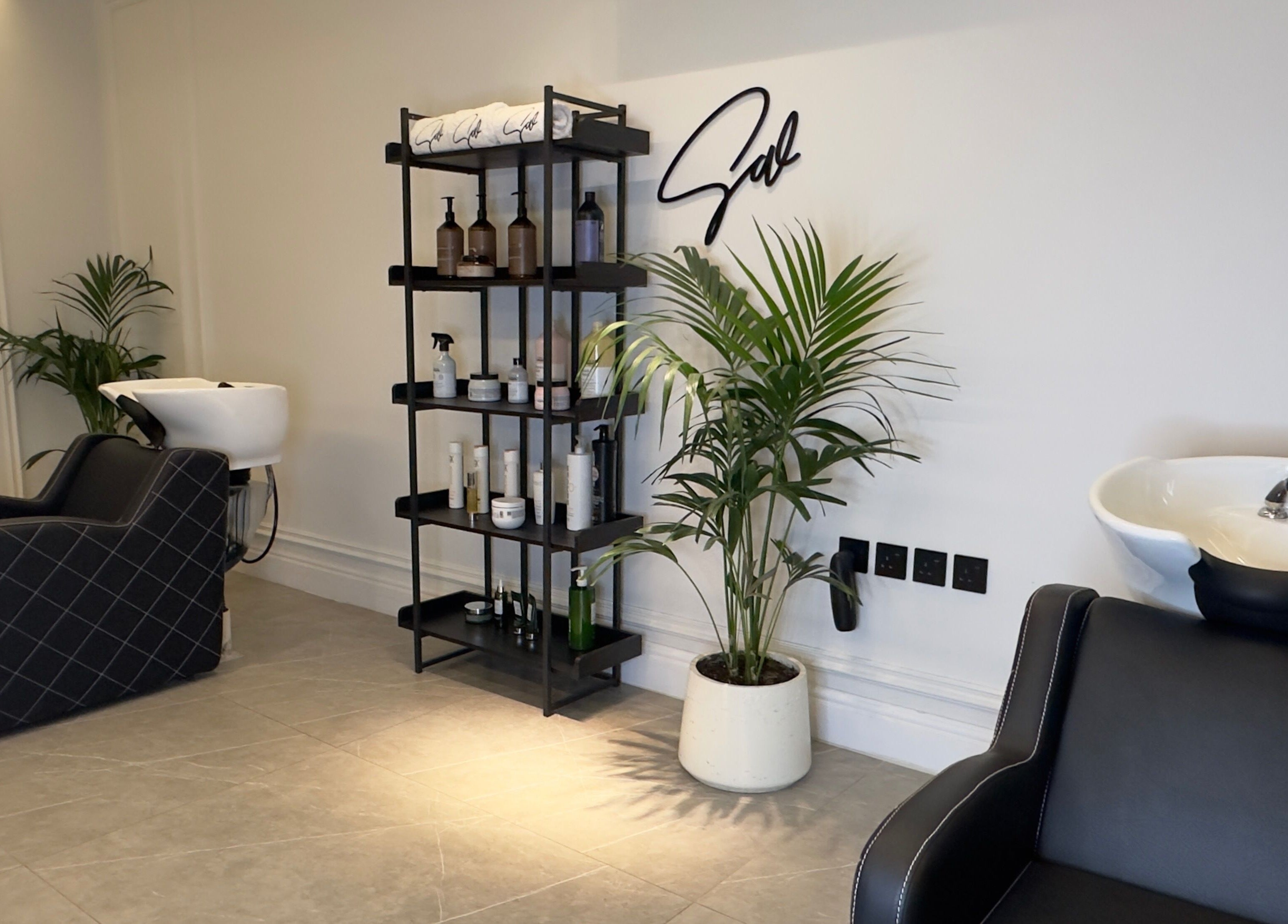 Modern salon interior at Sw Salon, featuring stylish wash stations in Riyadh, Riyadh Province, SA.