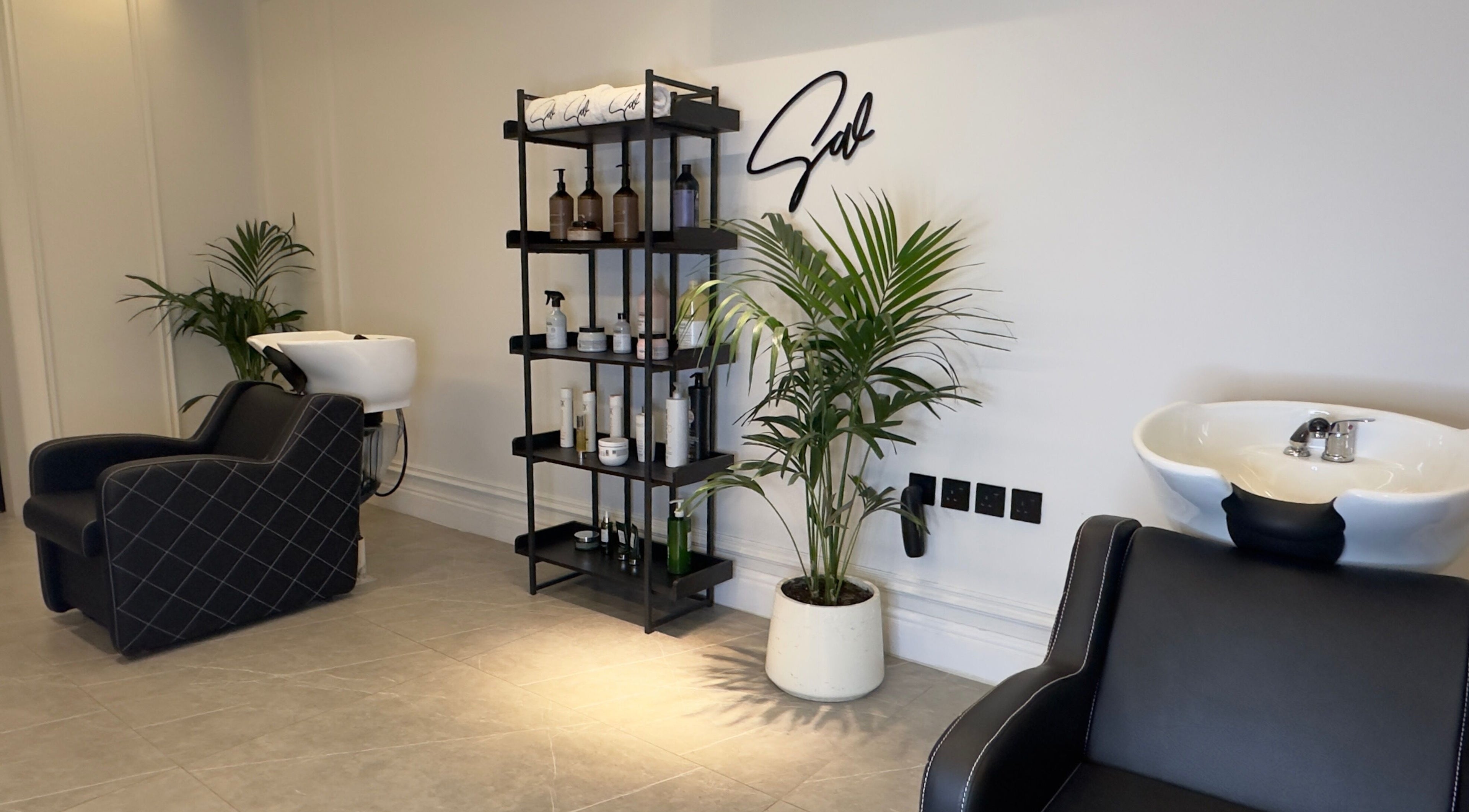 Modern salon interior at Sw Salon, featuring stylish wash stations in Riyadh, Riyadh Province, SA.