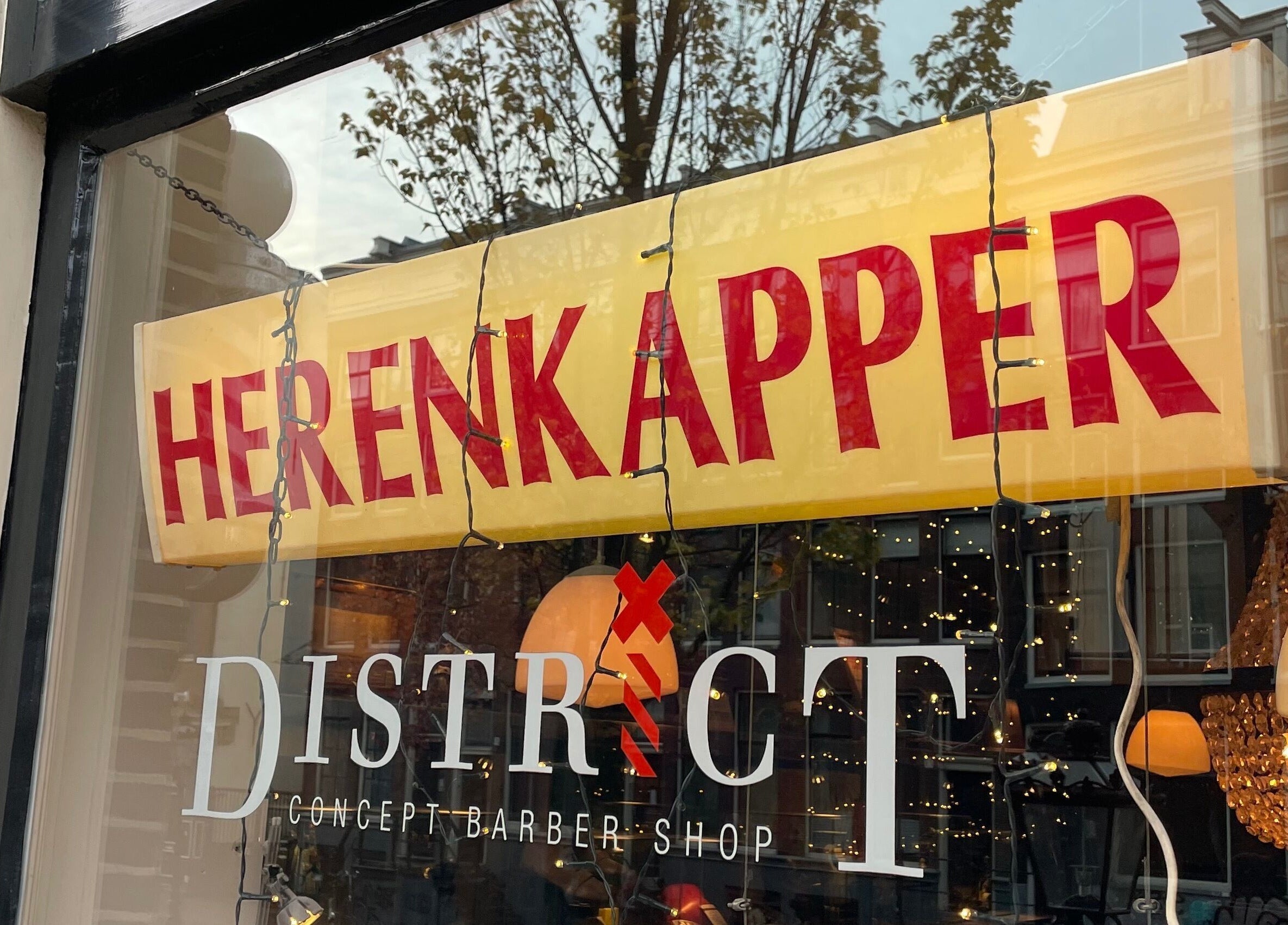 Cutting Casper exterior with chic barber sign in Amsterdam, Noord-Holland, NL.