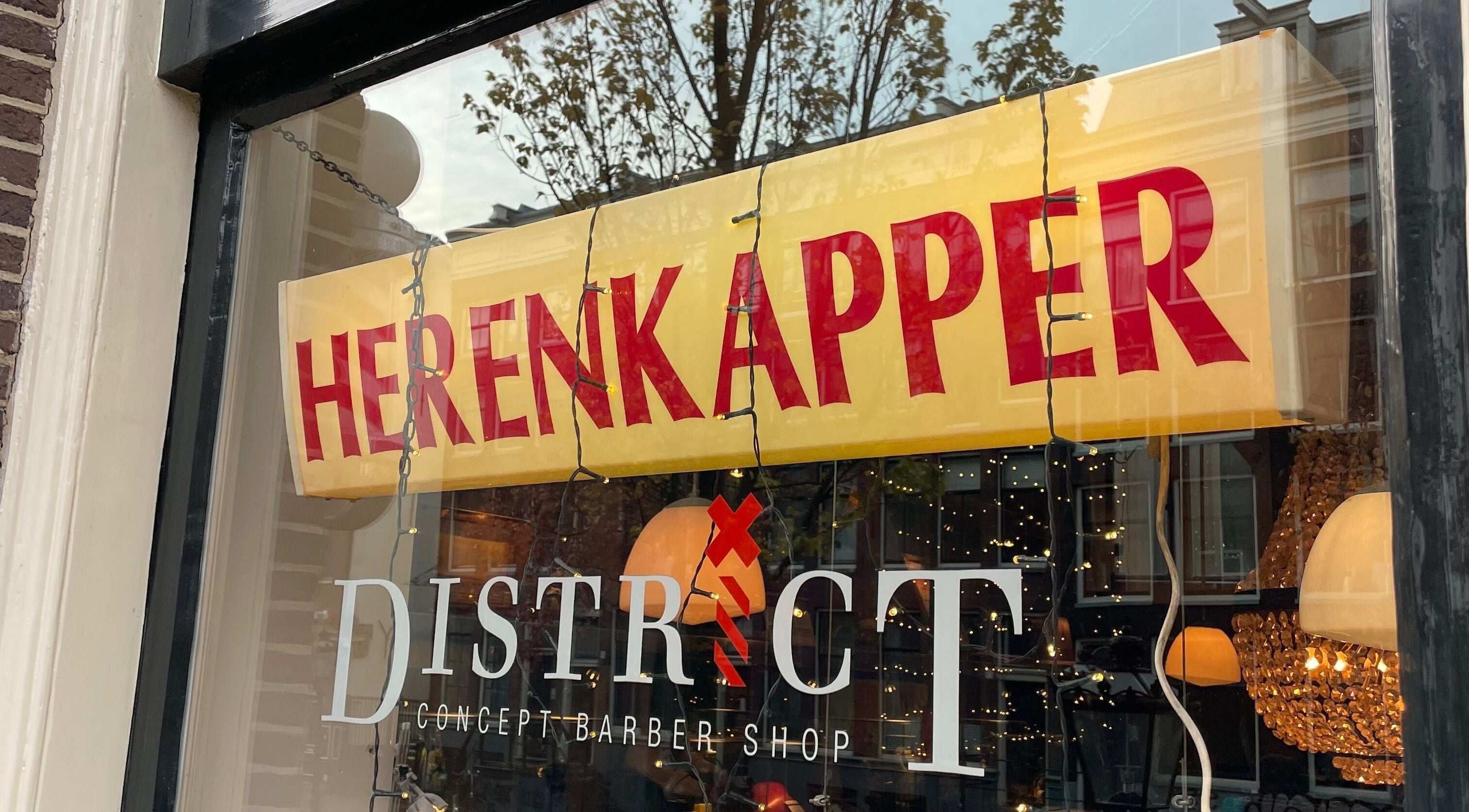 Cutting Casper exterior with chic barber sign in Amsterdam, Noord-Holland, NL.