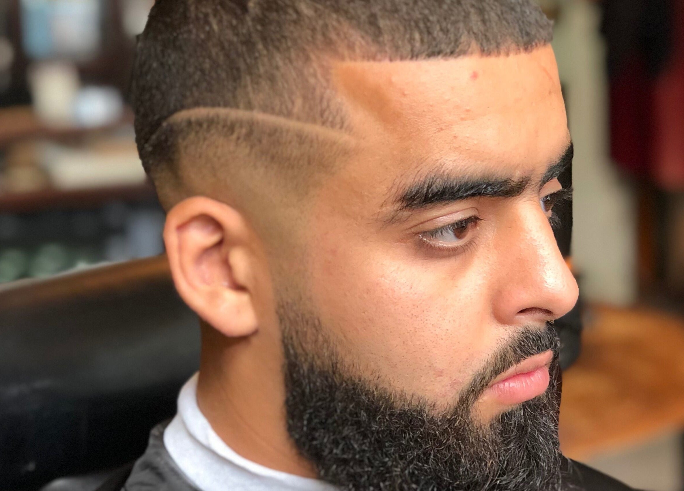 Man with stylish haircut at Cutting Casper in Amsterdam, Noord-Holland, NL.