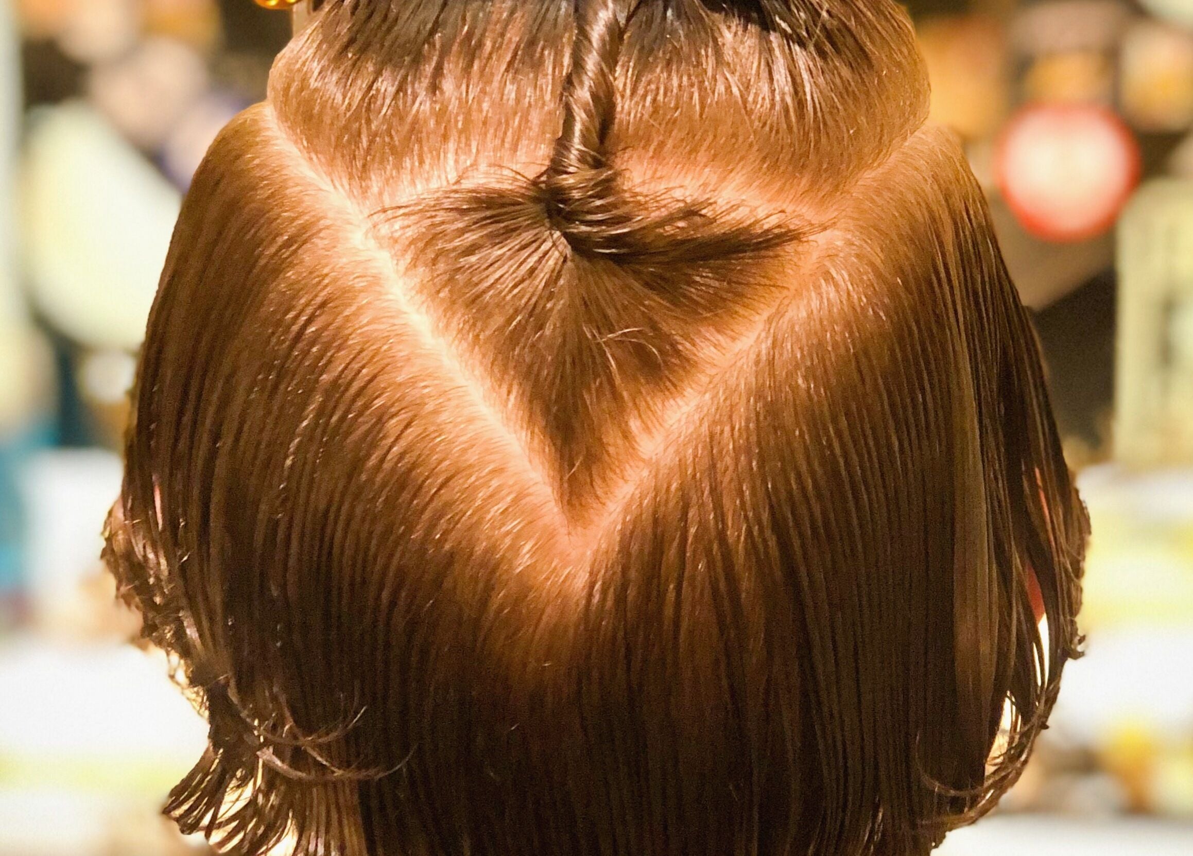 Close-up of stylishly sleek hair at Cutting Casper, Amsterdam, Noord-Holland, NL salon.