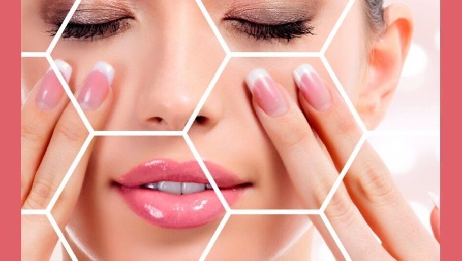 Close-up of a woman's face and nails at I Beautify, Royal Tunbridge Wells, GB.